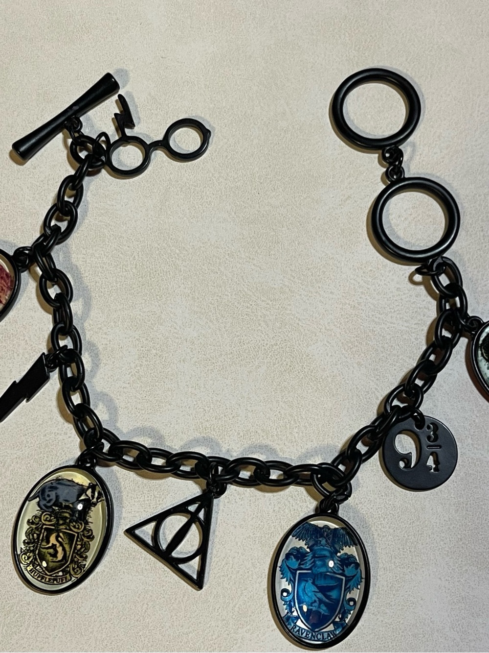 NWOT Harry Potter Charm Bracelet with Hogwarts House Enamel Cabochons/Sz 7.5